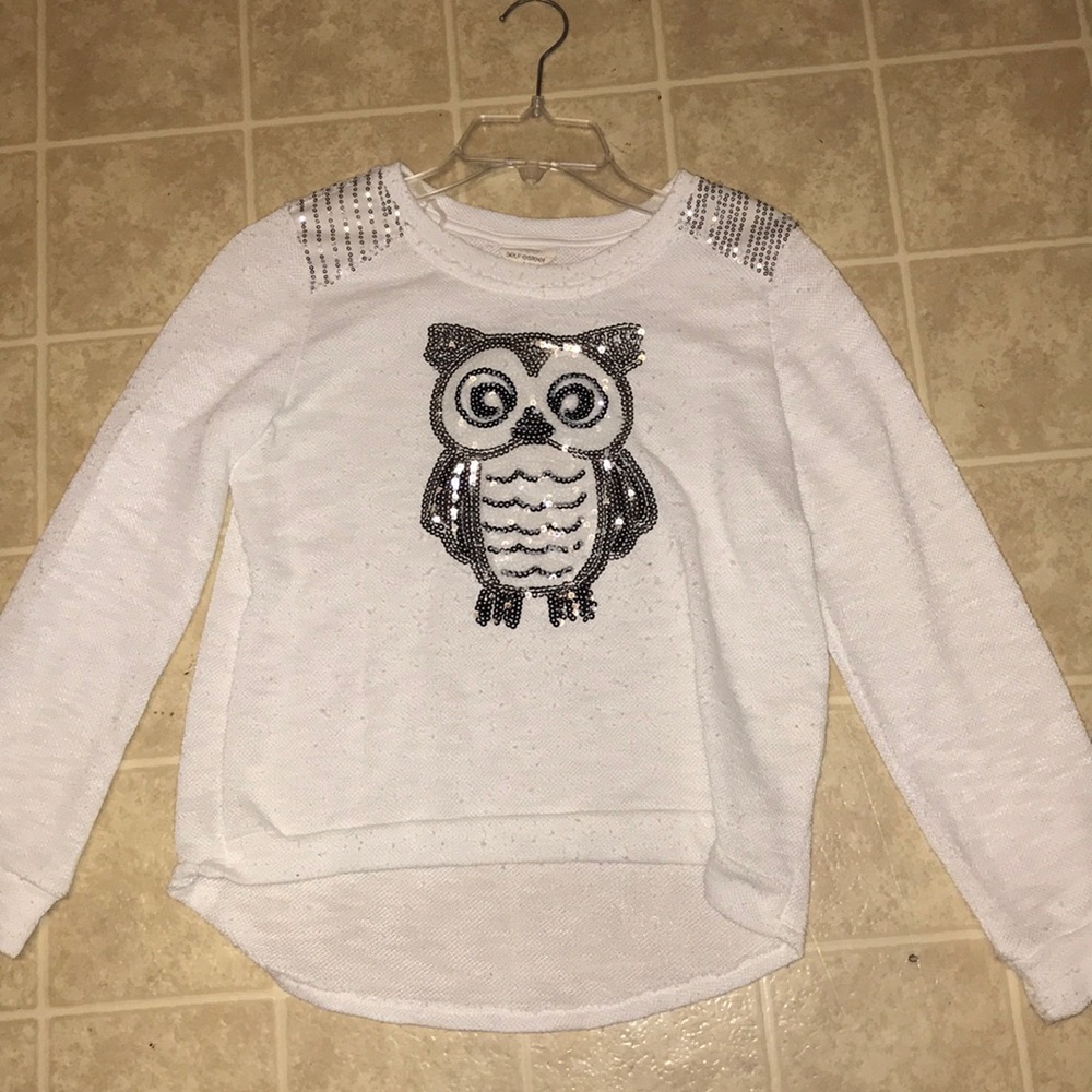 A girls white long sleeve